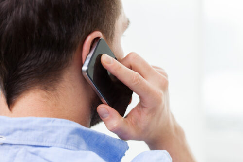 person talking on their cell phone