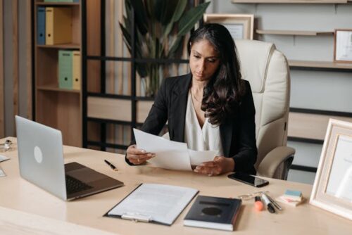 woman looking at documents